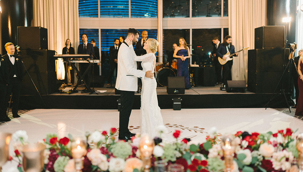 Wedding in our Metropolis ballroom with a live band and the bride and groom in the center of the dance floor