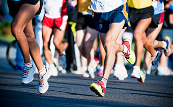 Close up of runners' legs