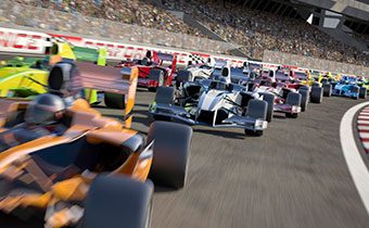 F1 race cars driving around track
